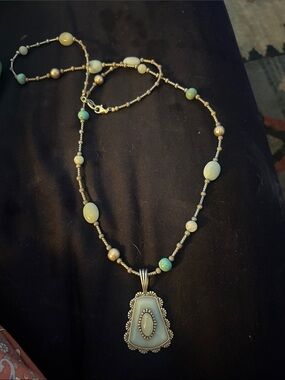 Sincerely Southwest. Silver and aventurine stone long necklace.